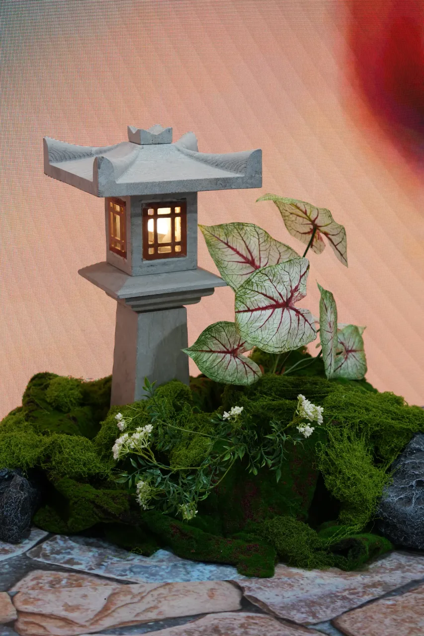 Japanese garden set-dressing detail on the Toyota stand