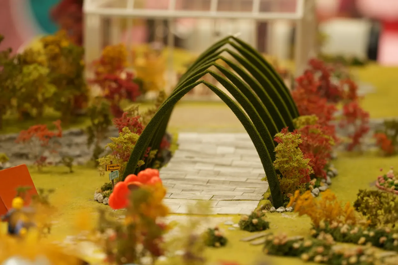 Miniature arched footbridge and garden, compressed at 232mm