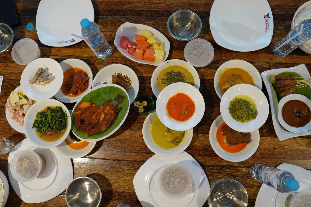 Nasi Padang spread — traditional Minangkabau cuisine, food photography